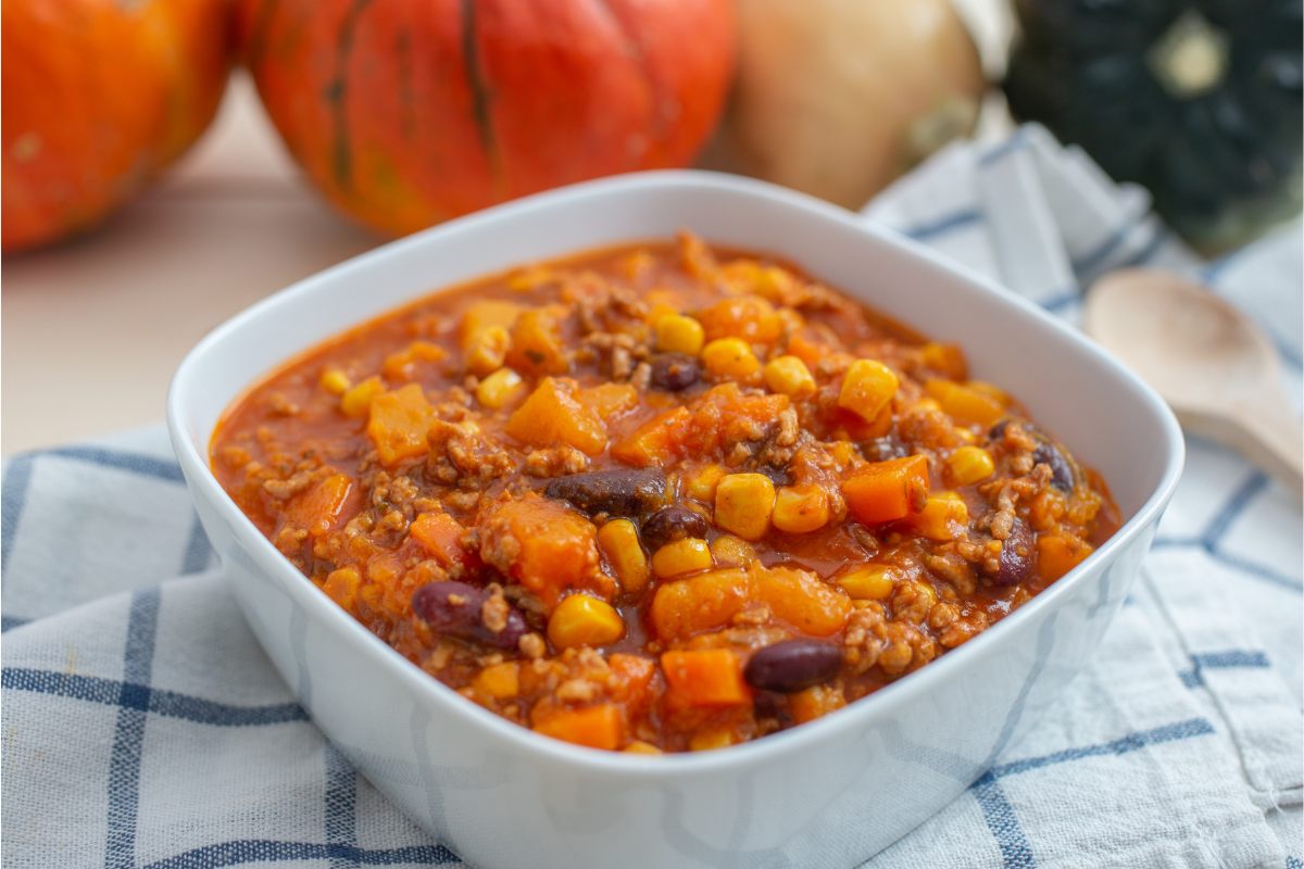 A blowl of chile con carne with pumpkin and sweetcorn.