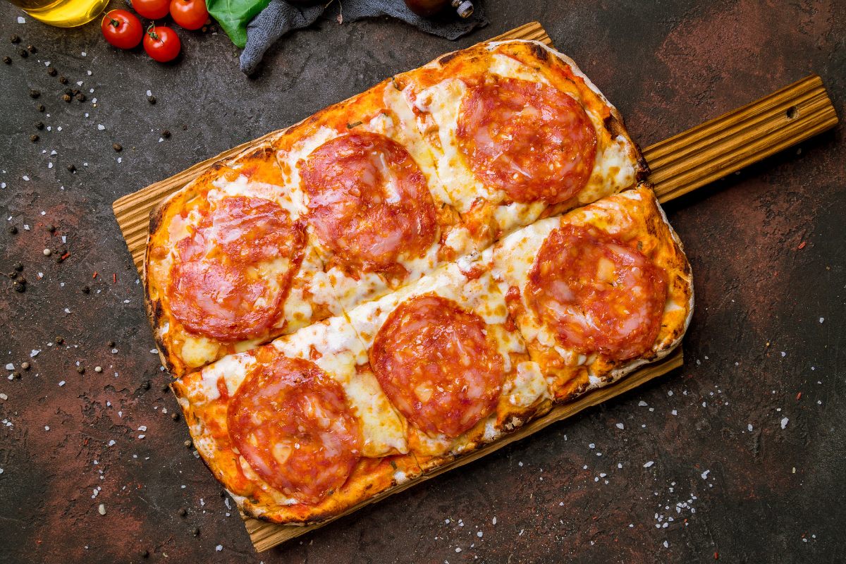 Pepperoni rectangular pizza divided into six portions.