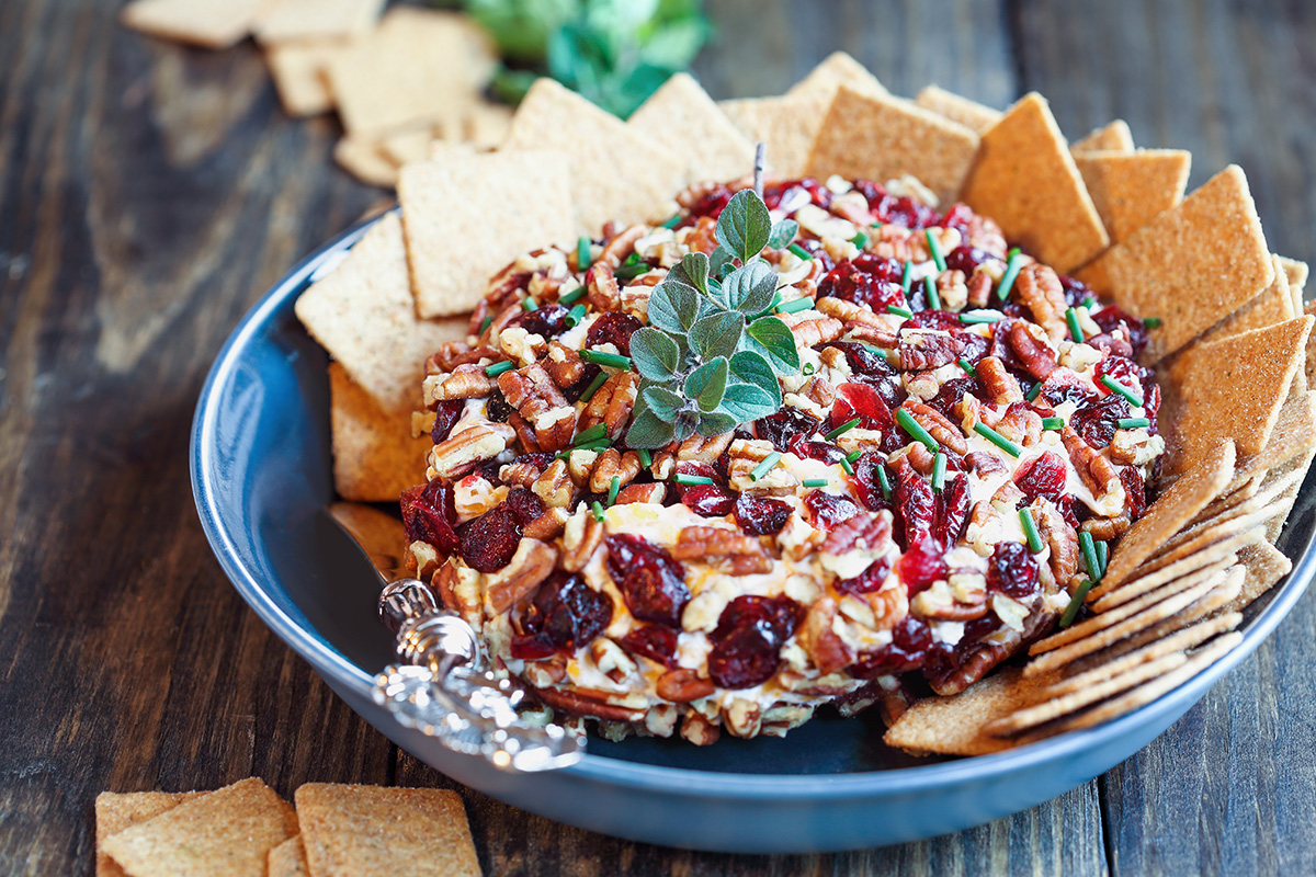 Cranberry and cram cheese spread with dried cranberries and pecan nuts.