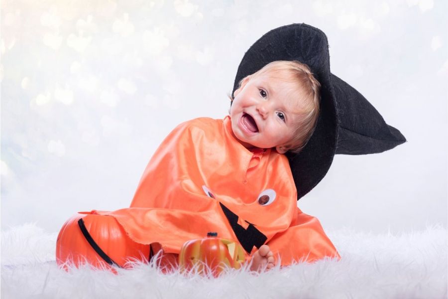 Baby girl celebrating her first Halloween.