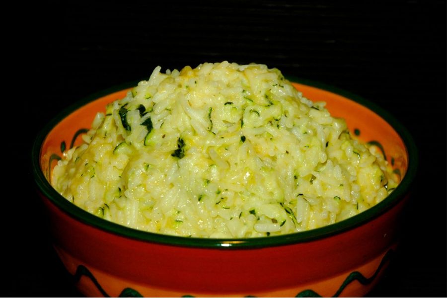 A bowl of cheesy zucchini rice.